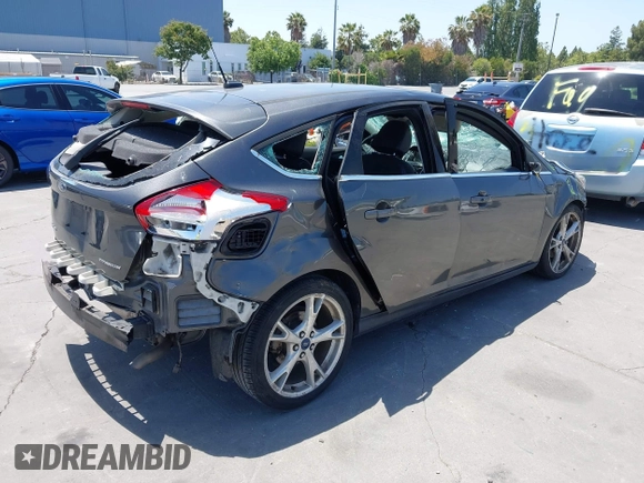 2015 Ford Focus Titanium with VIN 1FADP3N27FL380525, listed as a IAAI auction lot 42493542 with 86,423 mi miles and . Bid and sale history available at DreamBid. Image 4.