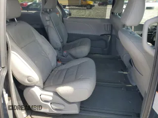 2015 Toyota Sienna XLE с VIN 5TDYK3DC7FS600281, выставлен на аукционе Copart как лот 53738065 с пробегом 91 207 миль миль и Списание • Salvage title. История ставок и продаж доступна на DreamBid. Изображение 11.