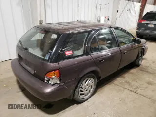 1998 Saturn SW z VIN 1G8ZK8271WZ165967, wystawiony jako Copart lot #73493044 z przebiegiem Nie podano mil oraz Szkody całkowita. Historia ofert i sprzedaży dostępna na DreamBid. Obrazek 3.