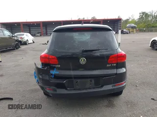 2013 Volkswagen Tiguan SE z VIN WVGAV3AX4DW607441, wystawiony jako IAAI lot #42173141 z przebiegiem 113 186 mil mil oraz . Historia ofert i sprzedaży dostępna na DreamBid. Obrazek 16.