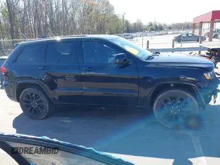 2017 Jeep Grand Cherokee Altitude with VIN 1C4RJEAG2HC880691, listed as a IAAI auction lot 41892221 with 116,008 mi miles and . Bid and sale history available at DreamBid. Image 14.