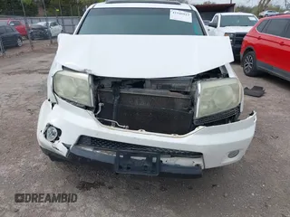 2009 Honda Pilot Touring with VIN 5FNYF48929B032510, listed as a IAAI auction lot 41945923 with 236,256 mi miles and . Bid and sale history available at carsss.com. Image 13.