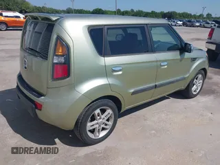 2010 Kia Soul + with VIN KNDJT2A21A7111933, listed as a IAAI auction lot 42025069 with 185,662 mi miles. Bid and sale history available at carsss.com. Image 4.