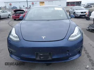 2021 Tesla Model 3 Long Range with VIN 5YJ3E1EB8MF848049, listed as a IAAI auction lot 40974331 with 61,462 mi miles. Bid and sale history available at carsss.com. Image 12.