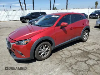 2016 Mazda CX-3 Touring z VIN JM1DKBC7XG0125839, wystawiony jako Copart lot #52792555 z przebiegiem Nie podano mil oraz Szkoda całkowita • Salvage title. Historia ofert i sprzedaży dostępna na DreamBid. Obrazek 1.