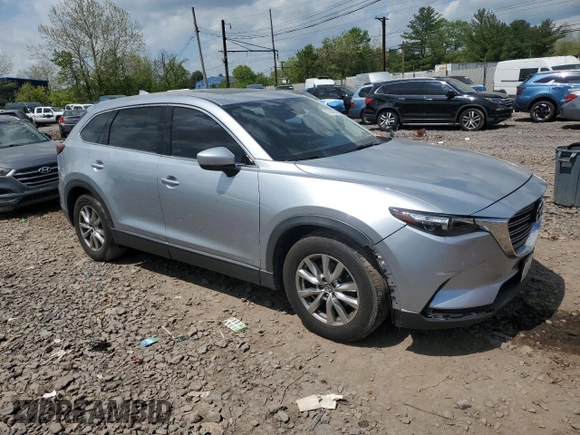 2016 Mazda CX-9 Touring z VIN JM3TCBCY0G0120898, wystawiony jako Copart lot #53628085 z przebiegiem 108 066 mil mil oraz Szkoda całkowita • Salvage title. Historia ofert i sprzedaży dostępna na DreamBid. Obrazek 4.