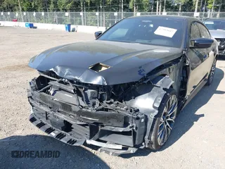 2022 BMW 4 Series M440i xDrive z VIN WBA13AW02NFL97513, wystawiony jako IAAI lot #42385642 z przebiegiem 33 827 mil mil oraz . Historia ofert i sprzedaży dostępna na DreamBid. Obrazek 6.