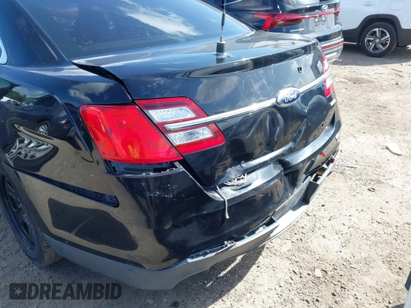 2014 Ford Police Interceptor with VIN 1FAHP2MK8EG185666, listed as a IAAI auction lot 42608018 with 141,523 mi miles and . Bid and sale history available at DreamBid. Image 12.