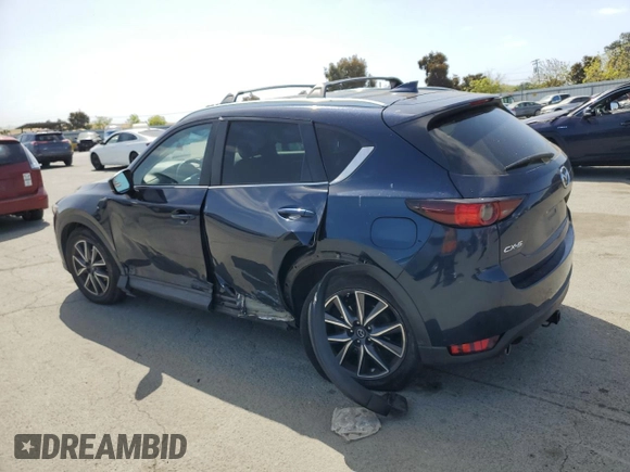 2018 Mazda CX-5 Touring with VIN JM3KFACM6J1323449, listed as a Copart auction lot 54090445 with 93,748 mi miles and Salvage Title. Bid and sale history available at carsss.com. Image 2.