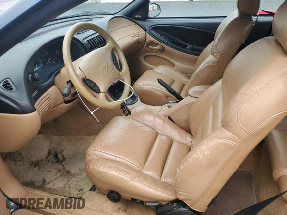 1994 Ford Mustang z VIN 1FALP45T3RF143074, wystawiony jako Copart lot #51442685 z przebiegiem 144 966 mil mil oraz Szkoda całkowita • Salvage title. Historia ofert i sprzedaży dostępna na DreamBid. Obrazek 7.