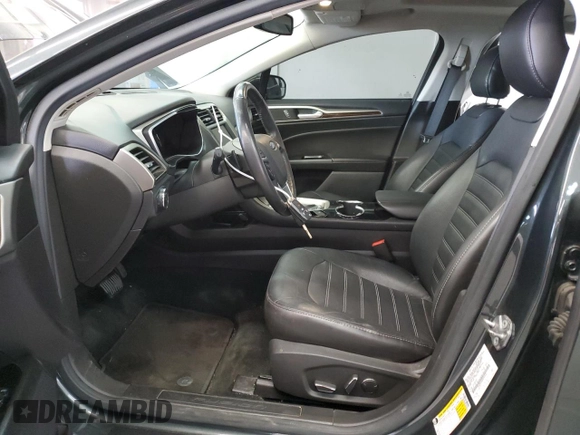 2015 Ford Fusion SE z VIN 3FA6P0H98FR295646, wystawiony jako Copart lot #57055105 z przebiegiem 121 515 mil mil oraz Szkoda całkowita • Salvage title. Historia ofert i sprzedaży dostępna na DreamBid. Obrazek 7.