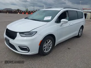 2022 Chrysler Pacifica Touring L with VIN 2C4RC1BG5NR170186, listed as a IAAI auction lot 41422057 with 71,204 mi miles and . Bid and sale history available at DreamBid. Image 2.