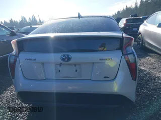 2016 Toyota Prius Four z VIN JTDKARFU8G3502915, wystawiony jako IAAI lot #41267499 z przebiegiem 110 002 mil mil oraz . Historia ofert i sprzedaży dostępna na DreamBid. Obrazek 16.