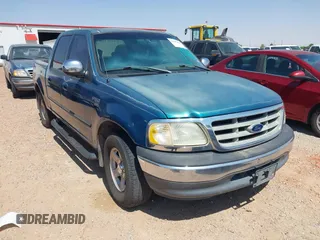 2001 Ford F-150 XLT with VIN 1FTRW07W01KA75819, listed as a IAAI auction lot 42293859 with 156,137 mi miles and . Bid and sale history available at DreamBid. Image 1.