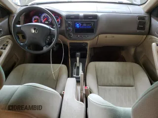 2004 Honda Civic LX with VIN 2HGES16694H910914, listed as a Copart auction lot 64241214 with 150,628 mi miles and Salvage Title. Bid and sale history available at DreamBid. Image 8.