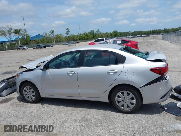 2023 Kia Rio S z VIN 3KPA24AD4PE604207, wystawiony jako IAAI lot #42077201 z przebiegiem 16 559 mil mil oraz . Historia ofert i sprzedaży dostępna na DreamBid. Obrazek 14.