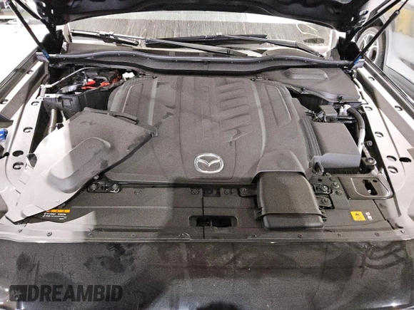 2025 Mazda CX-90 Premium Sport z VIN JM3KKCHD0S1218357, wystawiony jako Copart lot #57452545 z przebiegiem 1 097 mil mil oraz Szkoda całkowita • Salvage title. Historia ofert i sprzedaży dostępna na DreamBid. Obrazek 12.