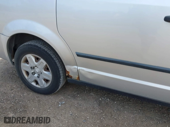 2008 Dodge Grand Caravan Cargo with VIN 1D4HN11H78B172477, listed as a IAAI auction lot 42209091 with 135,504 mi miles and . Bid and sale history available at DreamBid. Image 12.