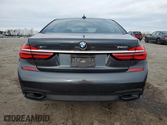 2019 BMW 7 Series 740i xDrive with VIN WBA7E4C51KGV70031, listed as a Copart auction lot 38008974 with 33,555 mi miles and . Bid and sale history available at DreamBid. Image 6.