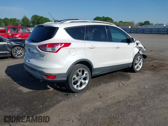2013 Ford Escape Titanium with VIN 1FMCU0J97DUA70393, listed as a IAAI auction lot 41974106 with 73,548 mi miles and . Bid and sale history available at carsss.com. Image 4.