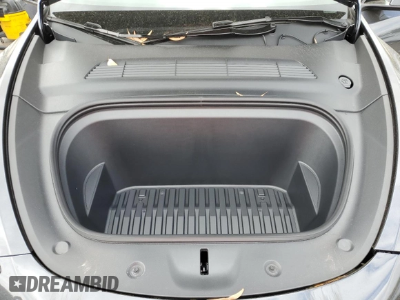2025 Tesla Model Y Long Range with VIN 7SAYGDED6SF228626, listed as a Copart auction lot 47654525 with 2,087 mi miles and Salvage Title. Bid and sale history available at DreamBid. Image 12.