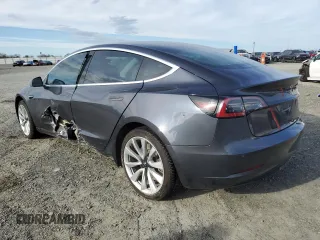 2019 Tesla Model 3 Mid Range with VIN 5YJ3E1EA3KF425416, listed as a Copart auction lot 46623325 with 84,060 mi miles and Salvage Title. Bid and sale history available at DreamBid. Image 2.