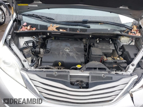 2013 Toyota Sienna XLE with VIN 5TDDK3DC5DS070243, listed as a IAAI auction lot 41162661 with 149,672 mi miles and . Bid and sale history available at DreamBid. Image 10.