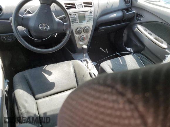 2009 Toyota Yaris with VIN JTDBT903391300394, listed as a Copart auction lot 53392945 with 227,210 mi miles and Salvage Title. Bid and sale history available at DreamBid. Image 8.