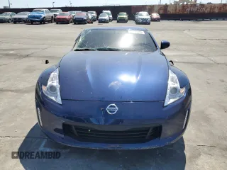 2016 Nissan 370Z z VIN JN1AZ4EH9GM933658, wystawiony jako Copart lot #48760215 z przebiegiem 70 682 mil mil oraz Szkoda całkowita • Salvage title. Historia ofert i sprzedaży dostępna na DreamBid. Obrazek 5.