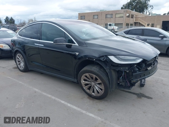 2017 Tesla Model X 90D with VIN 5YJXCAE2XHF075341, listed as a IAAI auction lot 41784008 with 77,439 mi miles and . Bid and sale history available at DreamBid. Image 1.