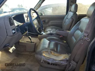 1997 GMC Yukon with VIN 1GKEK13R4VJ752757, listed as a Copart auction lot 75574214 with 251,193 mi miles and Clean Title. Bid and sale history available at carsss.com. Image 7.