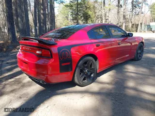 2012 Dodge Charger SE with VIN 2C3CDXBG3CH237431, listed as a IAAI auction lot 41864591 with 103,247 mi miles. Bid and sale history available at carsss.com. Image 4.