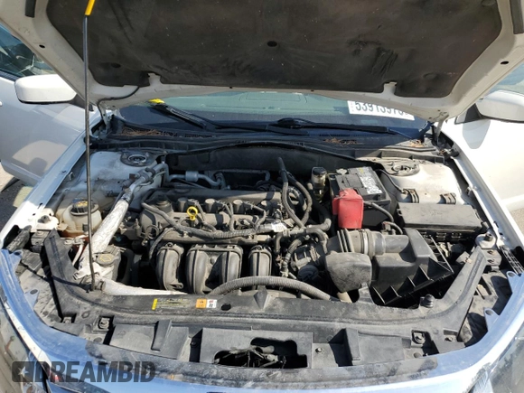 2012 Ford Fusion SEL z VIN 3FAHP0JAXCR220259, wystawiony jako Copart lot #53913975 z przebiegiem 145 424 mil mil oraz Szkoda całkowita • Salvage title. Historia ofert i sprzedaży dostępna na DreamBid. Obrazek 11.
