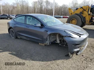 2022 Tesla Model 3 Long Range with VIN 5YJ3E1EB3NF275515, listed as a Copart auction lot 52566515 with 55,980 mi miles and Salvage Title. Bid and sale history available at carsss.com. Image 4.