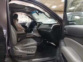 2015 Chevrolet Tahoe LT z VIN 1GNSKBKC1FR111299, wystawiony jako IAAI lot #41887115 z przebiegiem 157 666 mil mil oraz . Historia ofert i sprzedaży dostępna na DreamBid. Obrazek 5.
