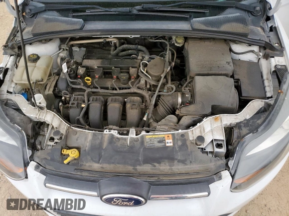 2014 Ford Focus SE z VIN 1FADP3K24EL187042, wystawiony jako Copart lot #57636395 z przebiegiem 105 918 mil mil oraz Szkoda całkowita • Salvage title. Historia ofert i sprzedaży dostępna na DreamBid. Obrazek 11.