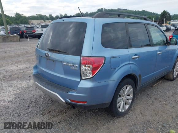 2011 Subaru Forester X Limited with VIN JF2SHAECXBH704853, listed as a IAAI auction lot 42500091 with 156,140 mi miles and . Bid and sale history available at DreamBid. Image 4.
