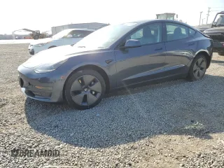 2023 Tesla Model 3 с VIN 5YJ3E1EA0PF455433, выставлен на аукционе Copart как лот 60568065 с пробегом 53 935 миль миль и Списание • Salvage title. История ставок и продаж доступна на DreamBid. Изображение 1.