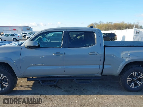 2018 Toyota Tacoma SR5 with VIN 3TMDZ5BN3JM054548, listed as a IAAI auction lot 42038480 with 122,242 mi miles and . Bid and sale history available at DreamBid. Image 14.