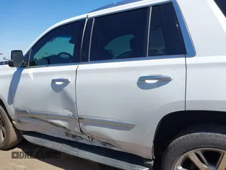 2016 Cadillac Escalade Luxury Collection z VIN 1GYS3BKJ2GR427147, wystawiony jako IAAI lot #41863121 z przebiegiem 104 459 mil mil oraz . Historia ofert i sprzedaży dostępna na DreamBid. Obrazek 14.
