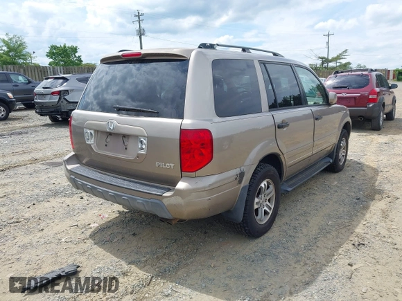 2004 Honda Pilot EX with VIN 2HKYF18434H575250, listed as a IAAI auction lot 42219882 with 196,515 mi miles and . Bid and sale history available at carsss.com. Image 4.