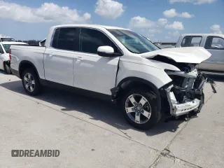 2025 Honda Ridgeline RTL z VIN 5FPYK3F53SB012947, wystawiony jako Copart lot #50899455 z przebiegiem Nie podano mil oraz Szkoda całkowita • Salvage title. Historia ofert i sprzedaży dostępna na DreamBid. Obrazek 7.