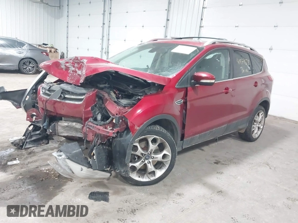 2013 Ford Escape Titanium with VIN 1FMCU9J98DUA72061, listed as a IAAI auction lot 41979558 with 176,667 mi miles and . Bid and sale history available at DreamBid. Image 2.