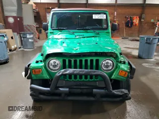 2005 Jeep Wrangler X с VIN 1J4FA39S35P305742, выставлен на аукционе Copart как лот 57124995 с пробегом 159 419 миль миль и Списание • Salvage title. История ставок и продаж доступна на DreamBid. Изображение 5.
