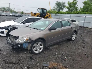 2011 Chevrolet Malibu 1LS with VIN 1G1ZB5E10BF200563, listed as a Copart auction lot 56359625 with 130,820 mi miles and Salvage Title. Bid and sale history available at DreamBid. Image 1.
