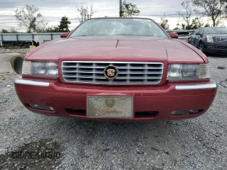 2001 Cadillac Eldorado ESC z VIN 1G6EL12Y11B103541, wystawiony jako Copart lot #45219055 z przebiegiem 46 179 mil mil oraz Tytuł czysty. Historia ofert i sprzedaży dostępna na DreamBid. Obrazek 5.