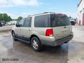 2004 Ford Expedition Special Service with VIN 1FMPU16L24LA37285, listed as a IAAI auction lot 41865431 with 244,616 mi miles. Bid and sale history available at carsss.com. Image 3.