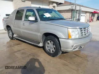 2005 Cadillac Escalade EXT z VIN 3GYEK62N95G242293, wystawiony jako IAAI lot #41767983 z przebiegiem 122 428 mil mil oraz . Historia ofert i sprzedaży dostępna na DreamBid. Obrazek 1.
