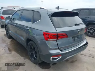 2022 Volkswagen Taos SE z VIN 3VVSX7B2XNM062037, wystawiony jako IAAI lot #42051064 z przebiegiem 30 149 mil mil oraz . Historia ofert i sprzedaży dostępna na DreamBid. Obrazek 3.