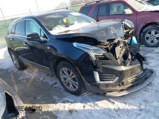 2021 Cadillac XT5 AWD Premium Luxury with VIN 1GYKNDRS2MZ152878, listed as a IAAI auction lot 41347259 with 21,891 mi miles. Bid and sale history available at carsss.com. Image 1.